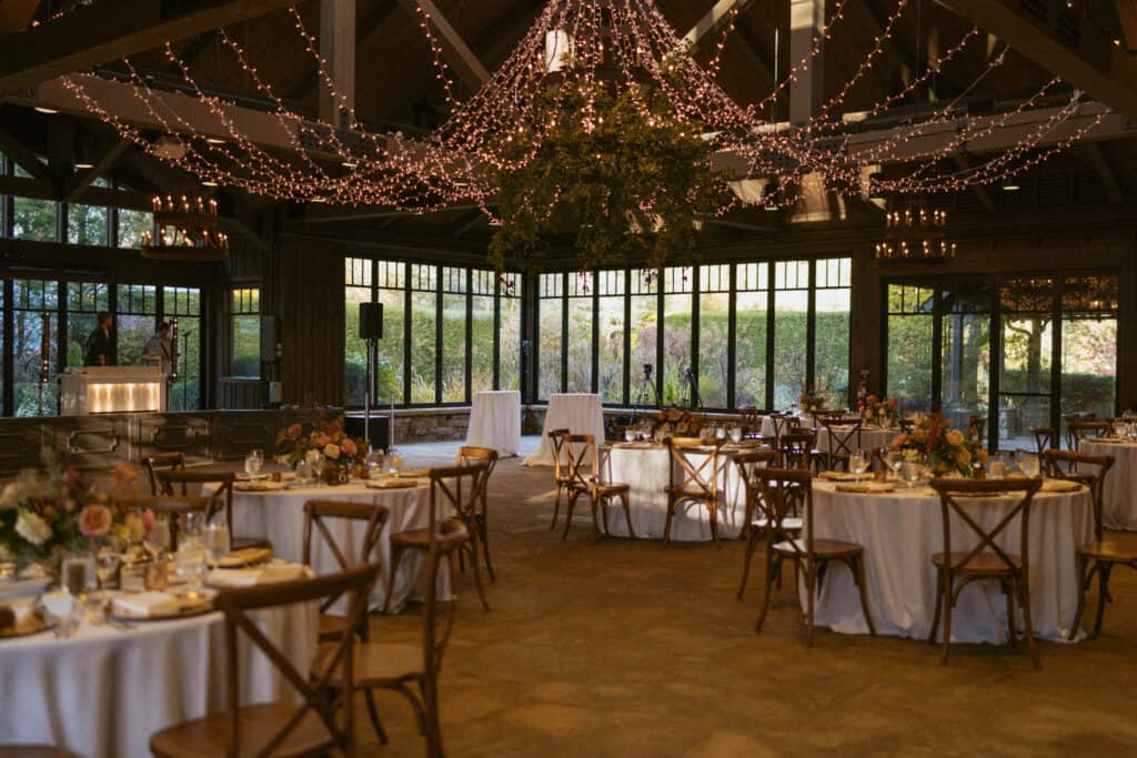 reception space of old edwards wedding venue with chandelier